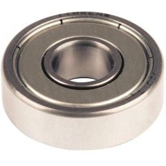 Rundes Metallteil mit zentraler Öffnung und Aufschrift